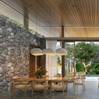 Modern dining area with natural stone and wood accents