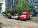 Street view with food trucks and residential building