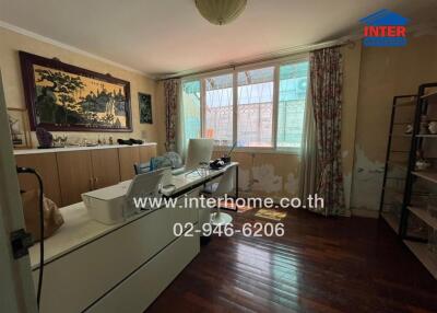 Cozy and well-lit living room with traditional decor