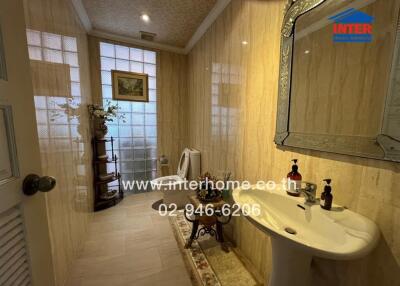 Elegant bathroom with well-maintained features