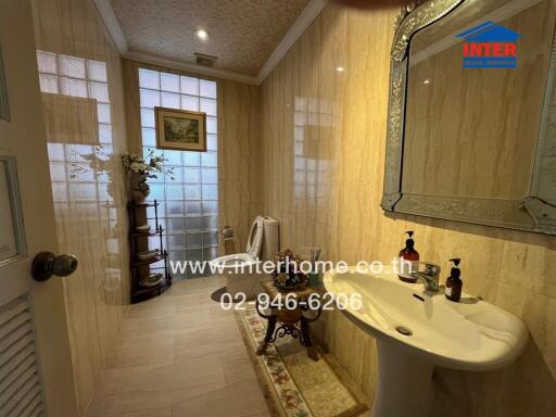 Elegant bathroom with well-maintained features