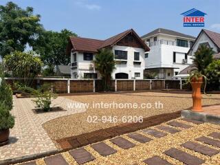 Spacious residential home with landscaped front yard