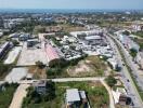 Aerial view of a suburban area with residential and commercial buildings