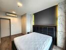 Modern bedroom with marble accents and ample lighting