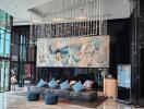 Luxurious hotel lobby with modern artistic decor and elegant seating area