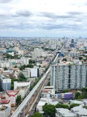 Aerial view of a cityscape showing dense urban development and infrastructure