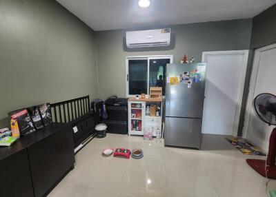 Compact kitchen with modern appliances and ample storage