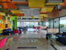 Colorful modern lobby in a commercial building with seating areas