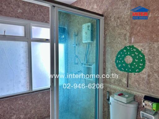 Modern bathroom with shower cabin and window