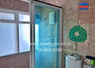 Modern bathroom with shower cabin and window