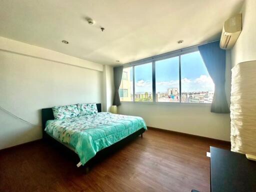 Bright and spacious bedroom with city view