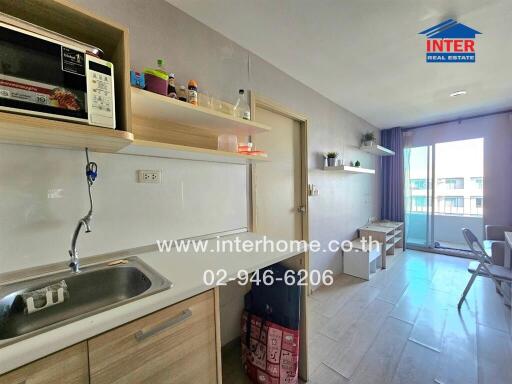 Modern kitchen with ample storage and natural light