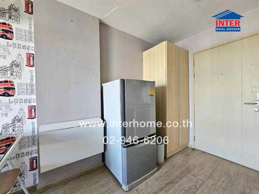 Compact bedroom with refrigerator and wardrobe