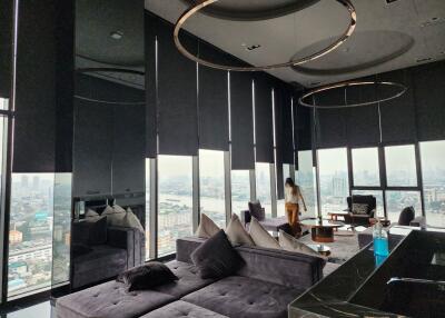 Luxurious high-rise living room with cityscape view