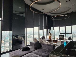 Luxurious high-rise living room with cityscape view