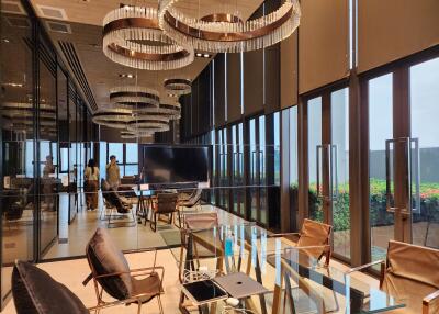 Luxurious modern office space with expansive windows and elegant lighting