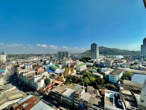 Panoramic city view from a high-rise building balcony