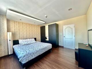 Spacious modern bedroom with elegant decor