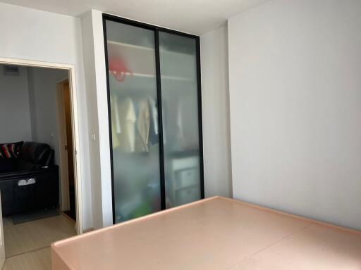 Minimalist bedroom with sliding door wardrobe