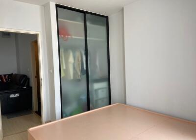 Minimalist bedroom with sliding door wardrobe