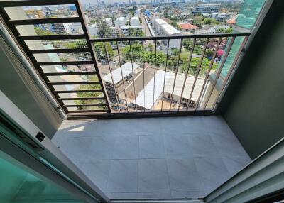 Spacious balcony with urban view and high safety railings