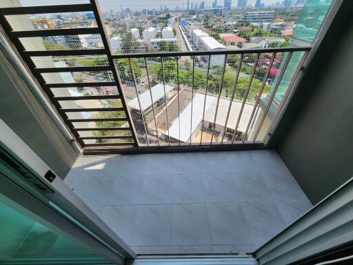 Spacious balcony with urban view and high safety railings