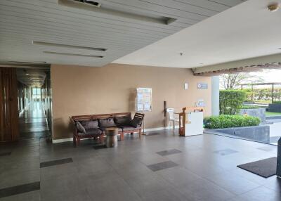 Spacious lobby area with modern furnishings and natural light