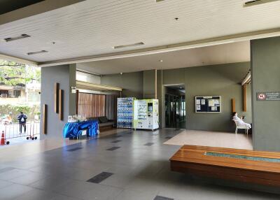 Spacious modern lobby with seating and informational brochures