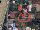 Aerial view of residential property marked for real estate listing