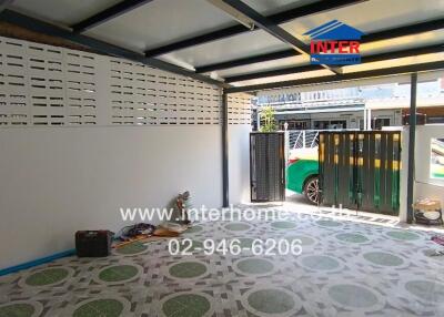 Modern residential garage with decorative tile flooring and ample space