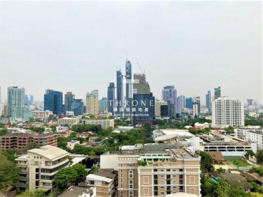 Panoramic view of a bustling city skyline with various buildings under construction