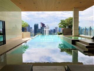 Luxurious rooftop infinity pool with city skyline view