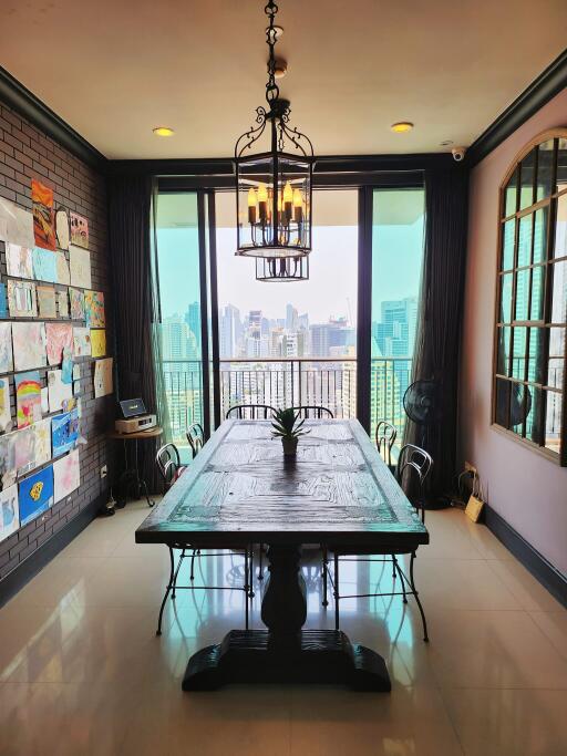 Elegant dining room with city view and vintage decor