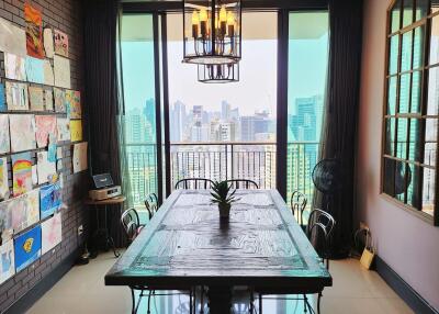 Elegant dining room with city view and vintage decor
