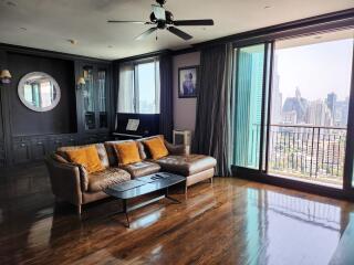 Spacious and elegantly decorated living room with city view