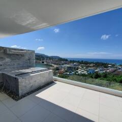 Spacious balcony with panoramic sea view and built-in bench