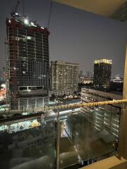 View from the balcony showcasing the urban skyline and ongoing construction