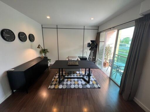 Modern living room with sleek furniture and natural lighting
