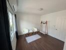 Bright modern bedroom with minimalist furniture