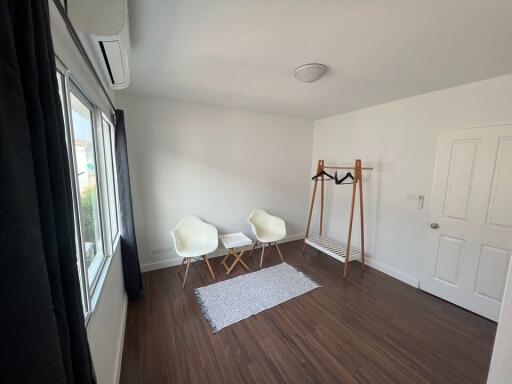 Bright modern bedroom with minimalist furniture