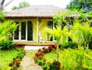 Charming tropical house with lush garden