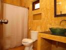 Elegant bathroom with golden walls and designer sink
