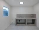 Modern minimalistic kitchen interior with under construction features