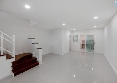 Spacious and modern interior of a residential building with bright lighting