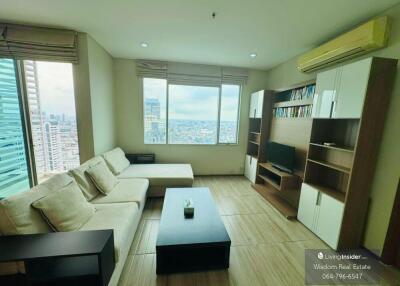 Spacious modern living room with cityscape view