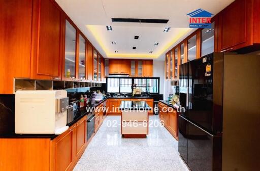 Spacious kitchen with modern appliances and ample cabinetry