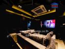 Modern home theater room with plush seating and ambient lighting