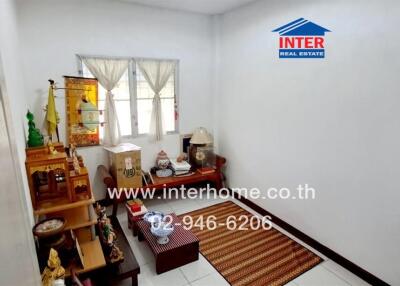 Well-maintained bedroom with ample natural lighting
