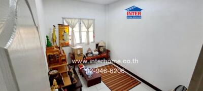 Well-maintained bedroom with ample natural lighting