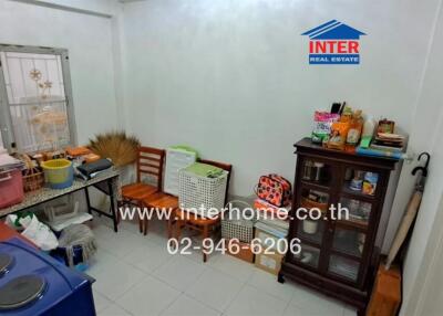 Spacious kitchen with storage cabinets and cooking appliances